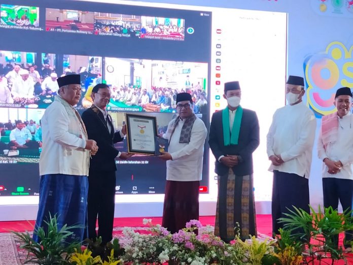 Keterangan foto: Sedekah Subuh ASN Kota Palembang Raih Rekor MURI (dok.istimewa)