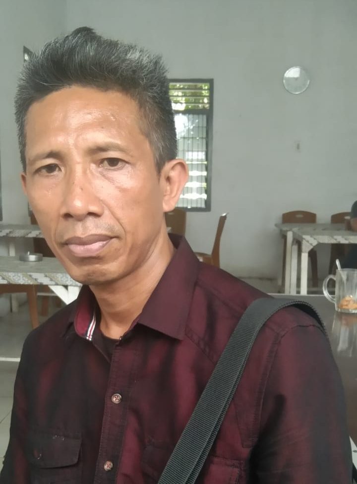 Keterangan foto : Warga dusun 7 desa Rawang Panca Arga Ebite Aritonang ( foto/Joko )